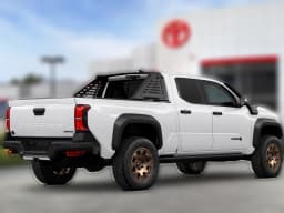 Toyota Tacoma 4WD Trailhunter Hybrid Double Cab 6' Bed AT (Natl) 2026 — side view