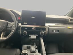 Toyota Tacoma 4WD TRD Off Road Hybrid Double Cab 5' Bed AT (Natl) 2026 — side view
