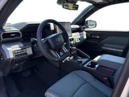 Toyota Tacoma 4WD Trailhunter Hybrid Double Cab 5' Bed AT (Natl) 2026 — side view