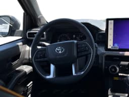 Toyota Tacoma 4WD Trailhunter Hybrid Double Cab 5' Bed AT (Natl) 2026 — side view