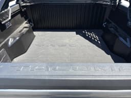 Toyota Tacoma 4WD Trailhunter Hybrid Double Cab 5' Bed AT (Natl) 2026 — side view