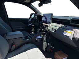 Toyota Tacoma 4WD Trailhunter Hybrid Double Cab 5' Bed AT (Natl) 2026 — side view