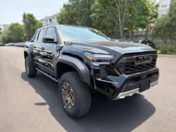 Toyota Tacoma 4WD Trailhunter Hybrid Double Cab 5' Bed AT (Natl) 2026 — side view