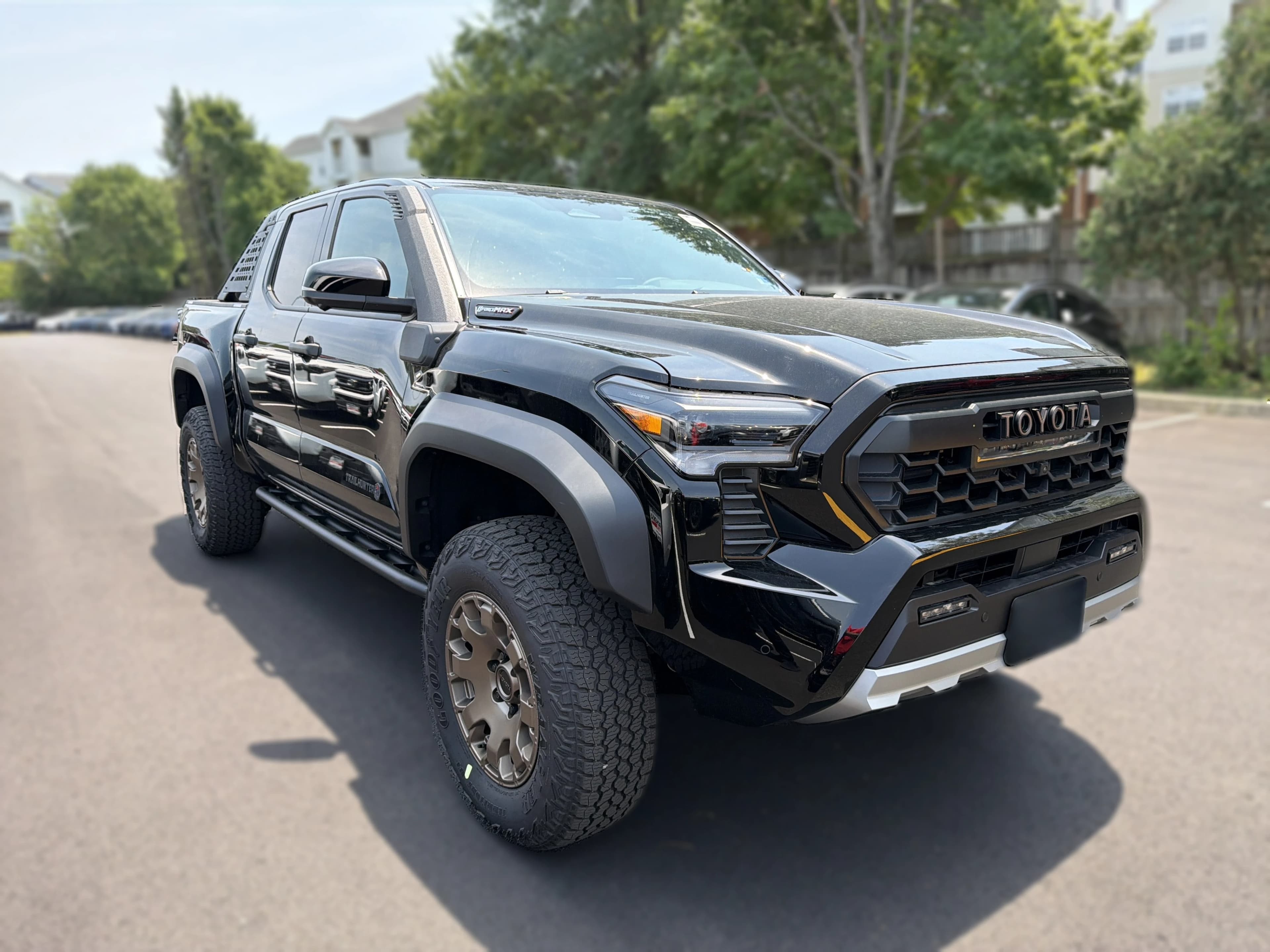 Toyota Tacoma 4WD Trailhunter Hybrid Double Cab 5' Bed AT (Natl) 2026 — side view