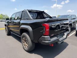 Toyota Tacoma 4WD Trailhunter Hybrid Double Cab 5' Bed AT (Natl) 2026 — side view