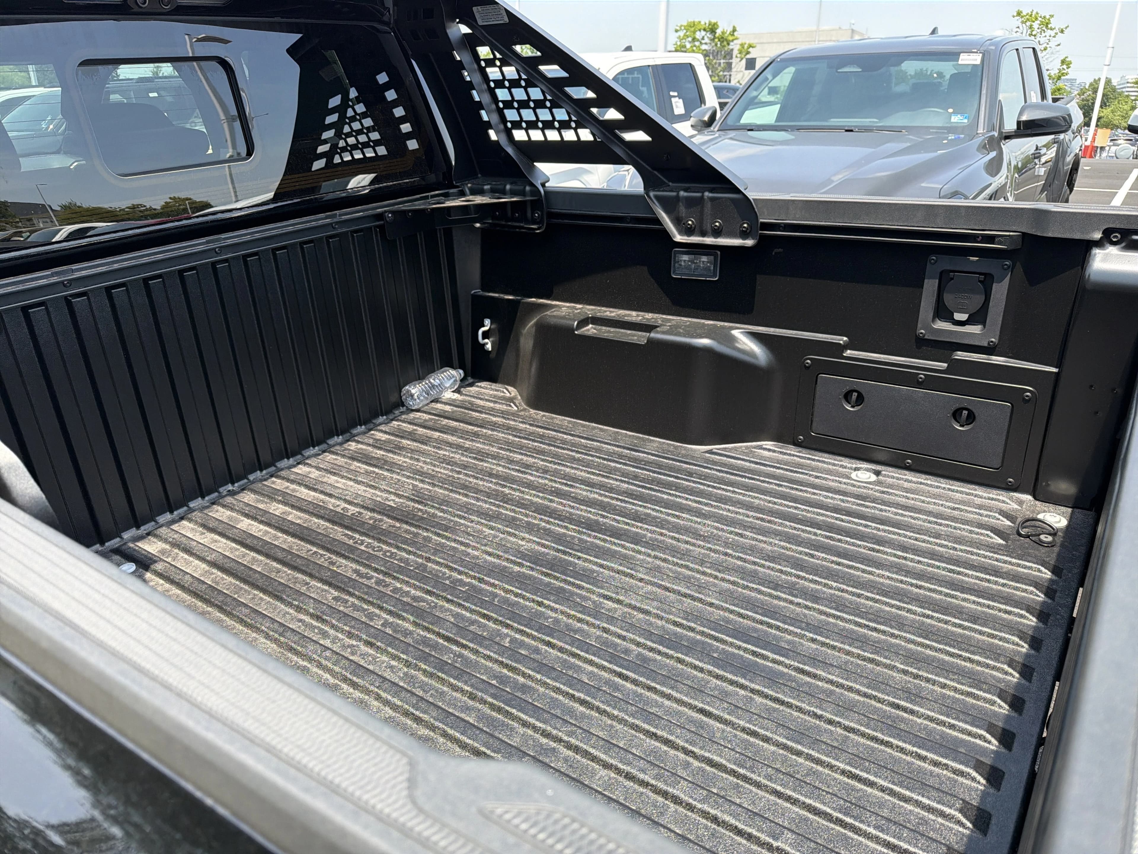 Toyota Tacoma 4WD Trailhunter Hybrid Double Cab 5' Bed AT (Natl) 2026 — side view