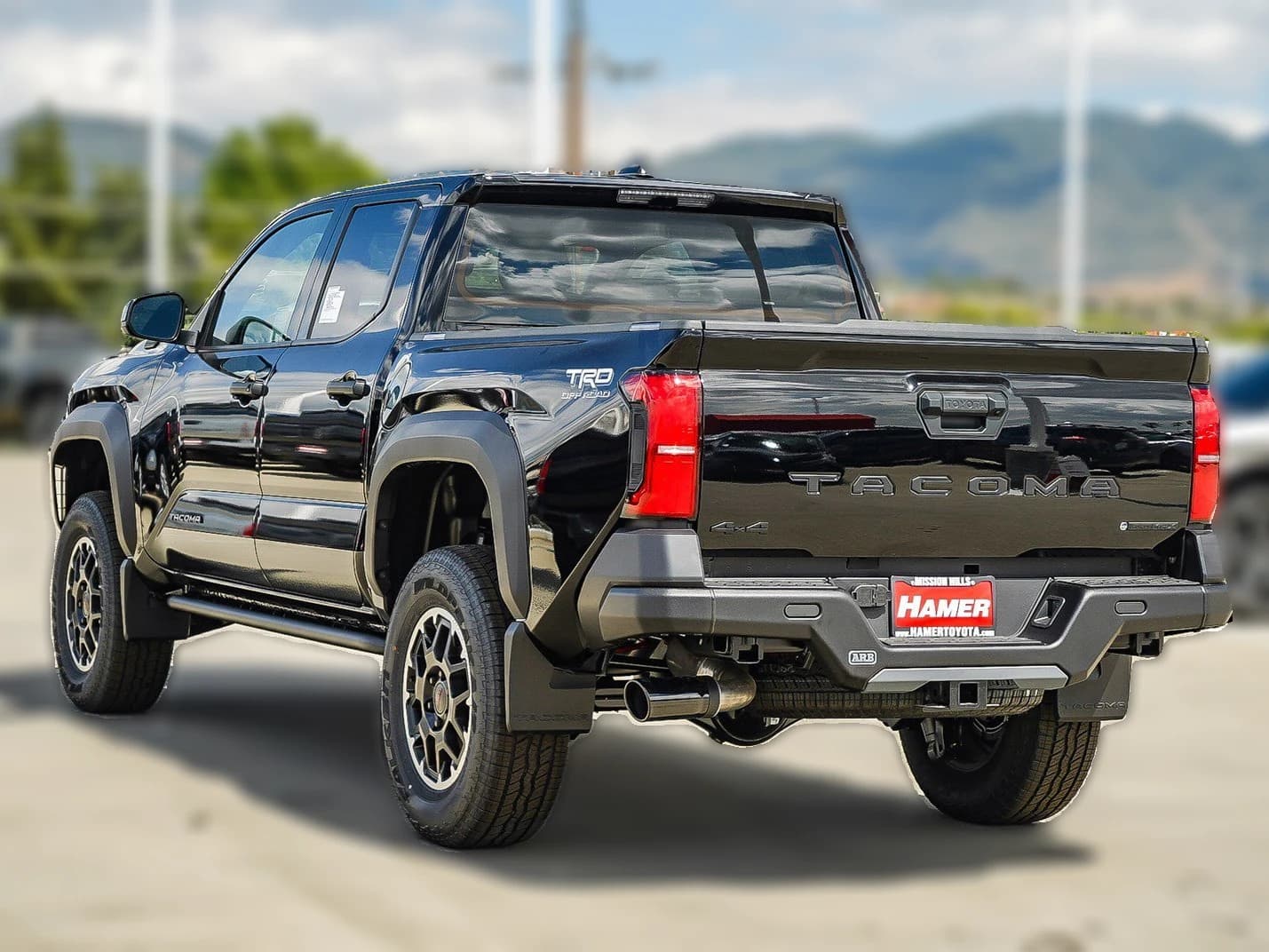 Toyota Tacoma 4WD TRD Off Road Hybrid Double Cab 5' Bed AT (Natl) 2026 — side view