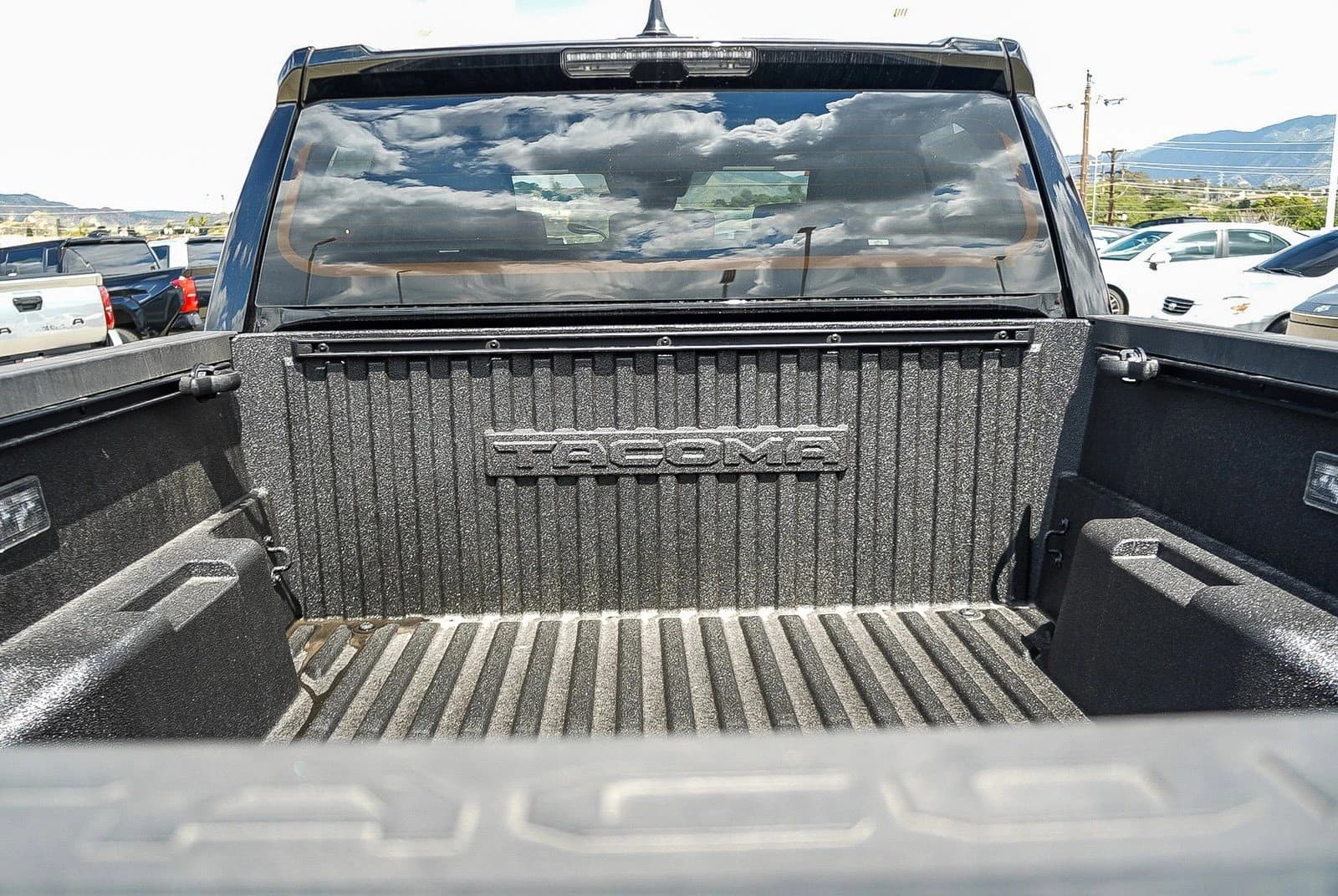 Toyota Tacoma 4WD TRD Off Road Hybrid Double Cab 5' Bed AT (Natl) 2026 — side view