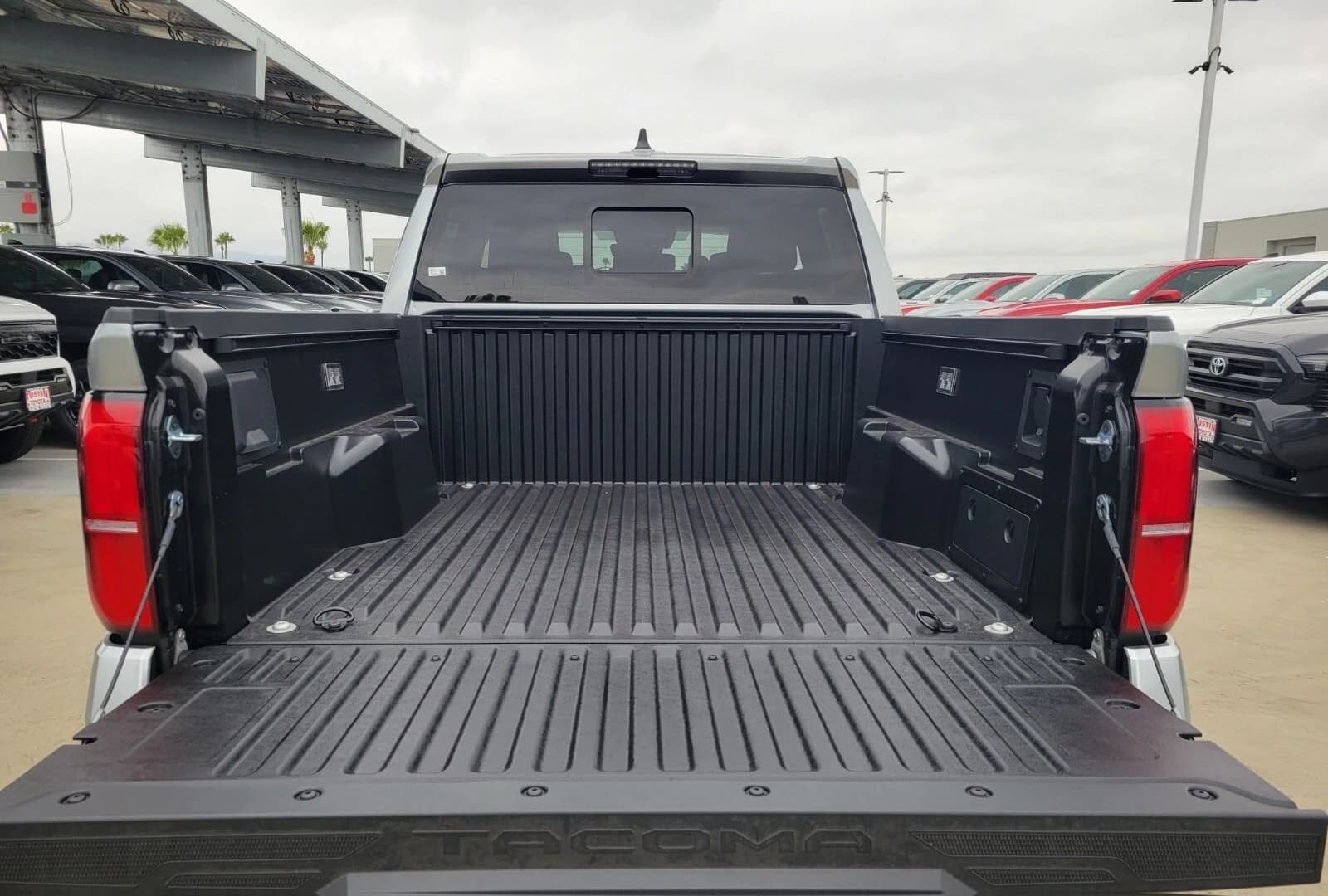 Toyota Tacoma 4WD TRD Off Road Hybrid Double Cab 5' Bed AT (Natl) 2026 — side view