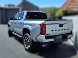 Toyota Tacoma 4WD TRD Off Road Double Cab 6' Bed AT (Natl) 2026 — side view