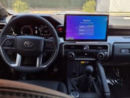 Toyota Tacoma 4WD TRD Off Road Double Cab 6' Bed AT (Natl) 2026 — side view