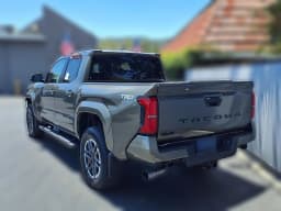 Toyota Tacoma 4WD TRD Sport Double Cab 5' Bed MT (Natl) 2026 — side view