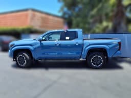 Toyota Tacoma 4WD TRD Sport Double Cab 5' Bed MT (Natl) 2026 — side view