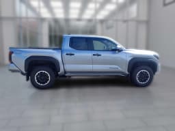 Toyota Tacoma 4WD TRD Off Road Double Cab 6' Bed AT (Natl) 2026 — side view