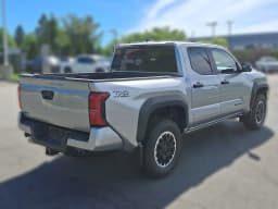 Toyota Tacoma 4WD TRD Off Road Double Cab 6' Bed AT (Natl) 2026 — side view