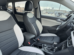 Volkswagen Taos SEL 4MOTION 2025 — side view