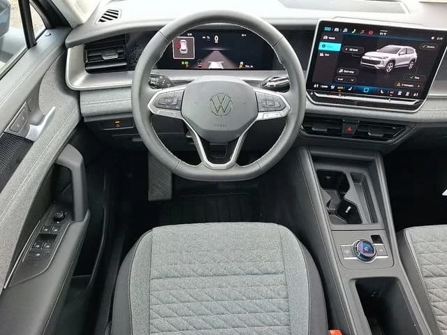 Volkswagen Tiguan S 4MOTION 2026 — side view