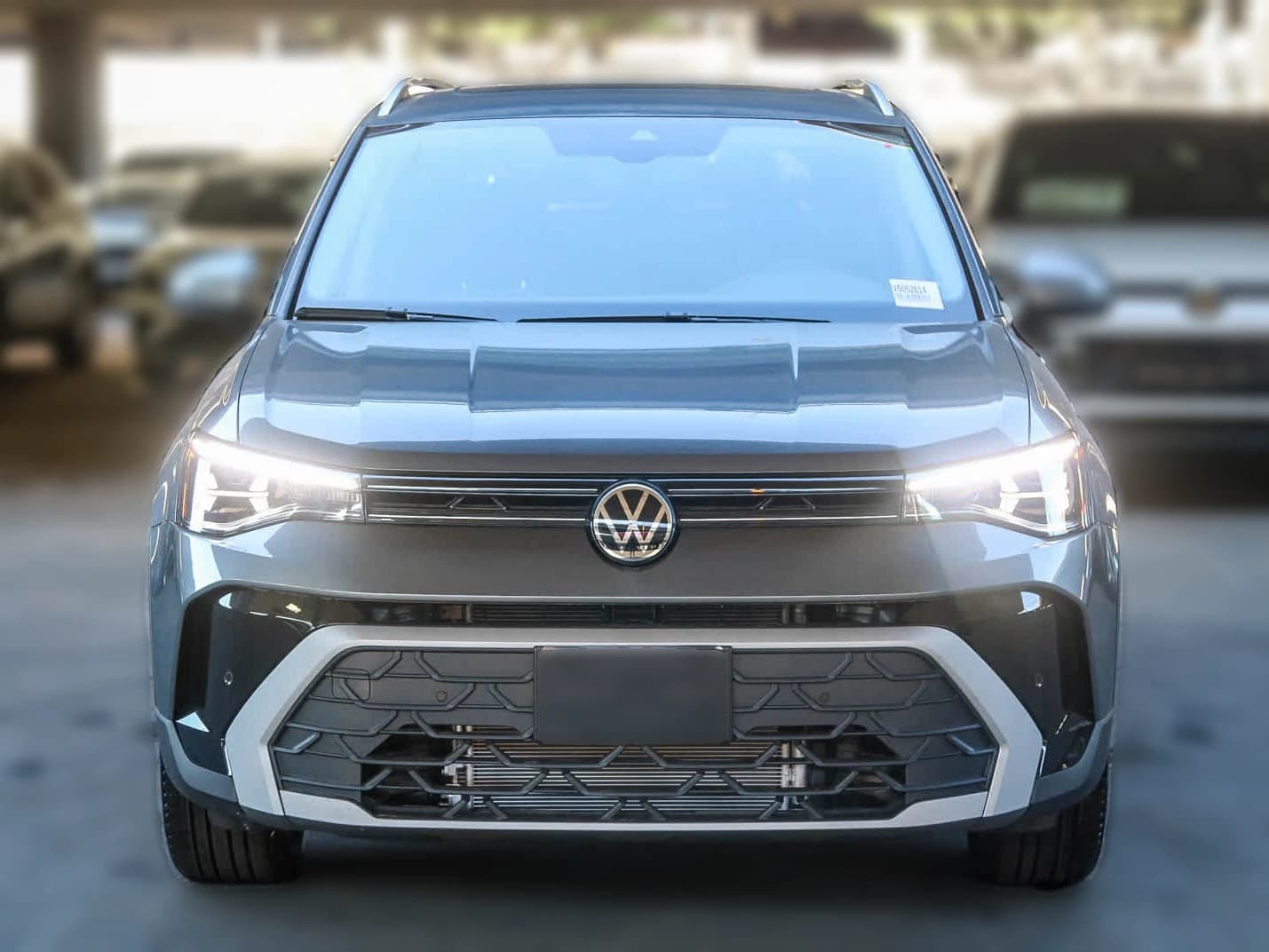 Volkswagen Taos SE FWD 2025 — side view