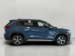 Volkswagen Tiguan SE 4MOTION 2026 — side view