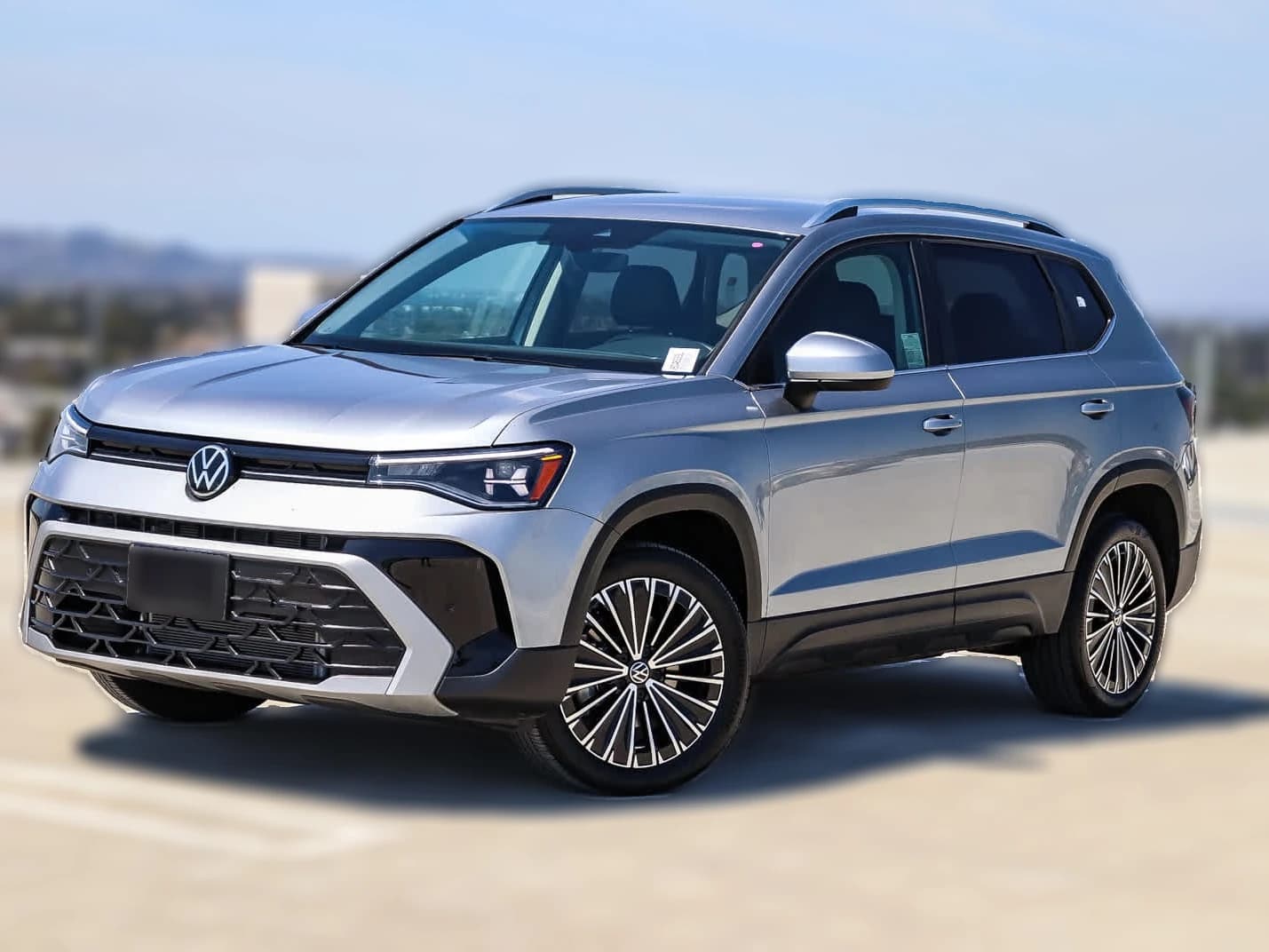 Volkswagen Taos SE FWD 2025 — side view