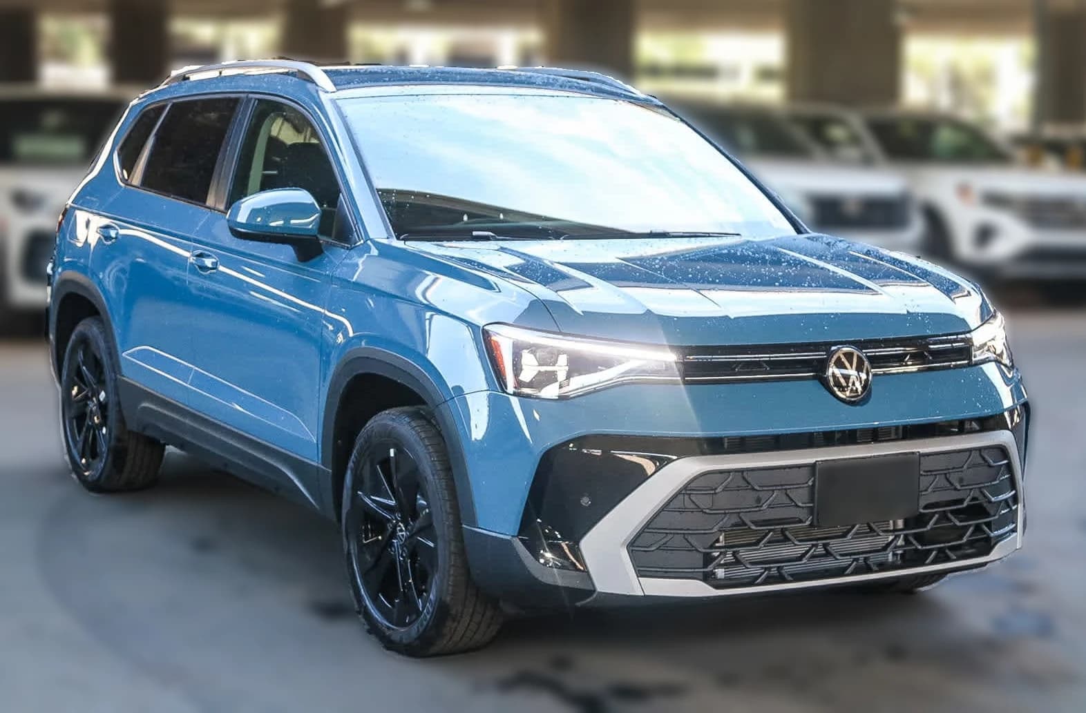 Volkswagen Taos SE FWD 2025 — side view