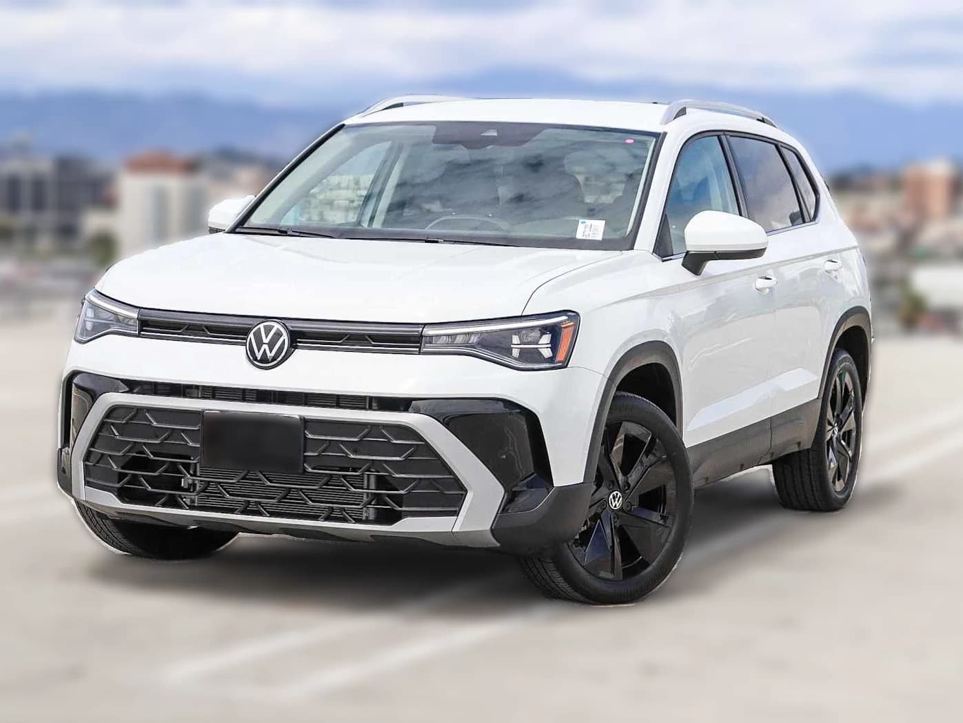 Volkswagen Taos SE FWD 2025 — side view