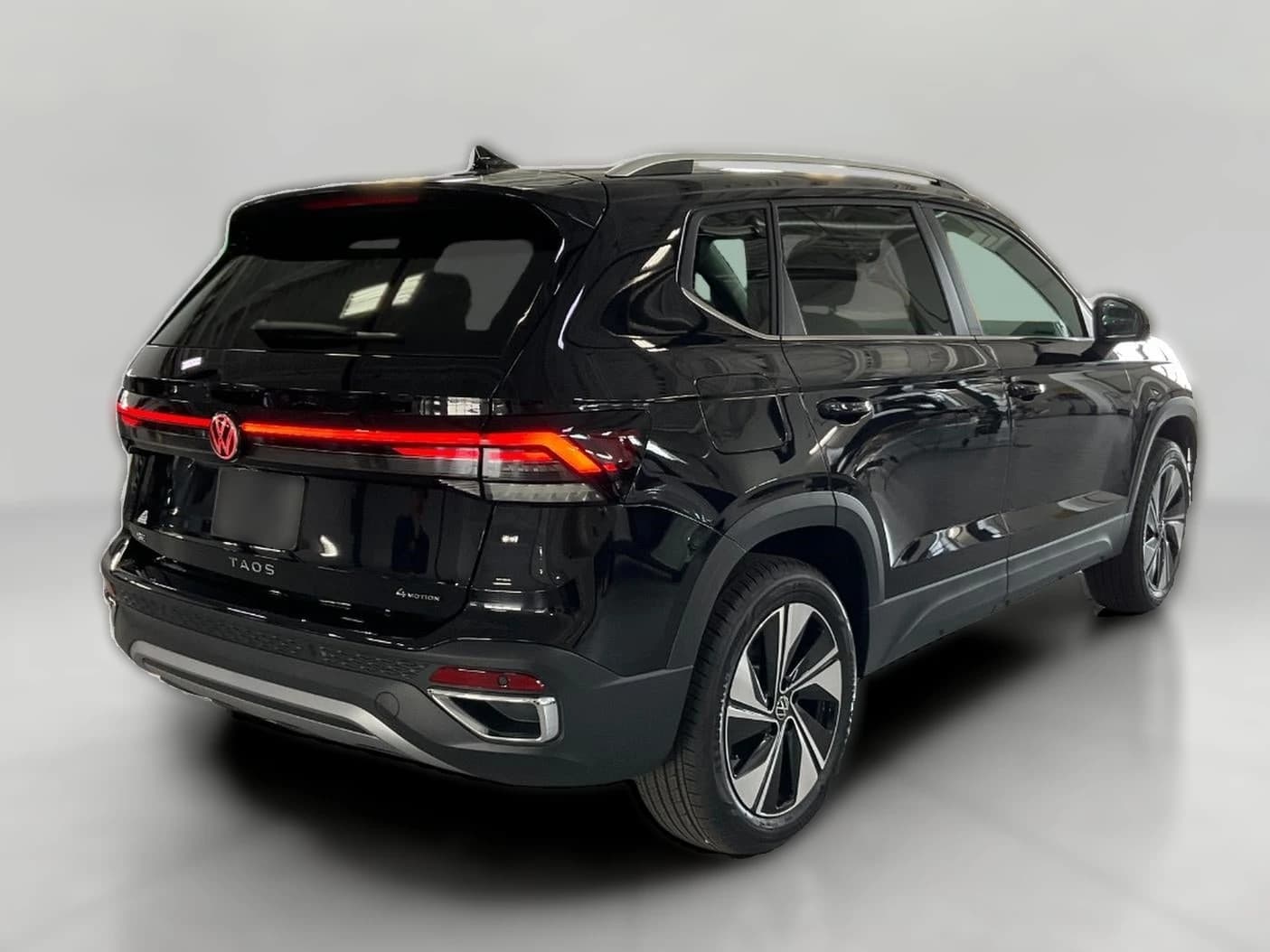 Volkswagen Taos SE 4MOTION 2026 — side view