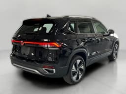 Volkswagen Taos SE 4MOTION 2026 — side view