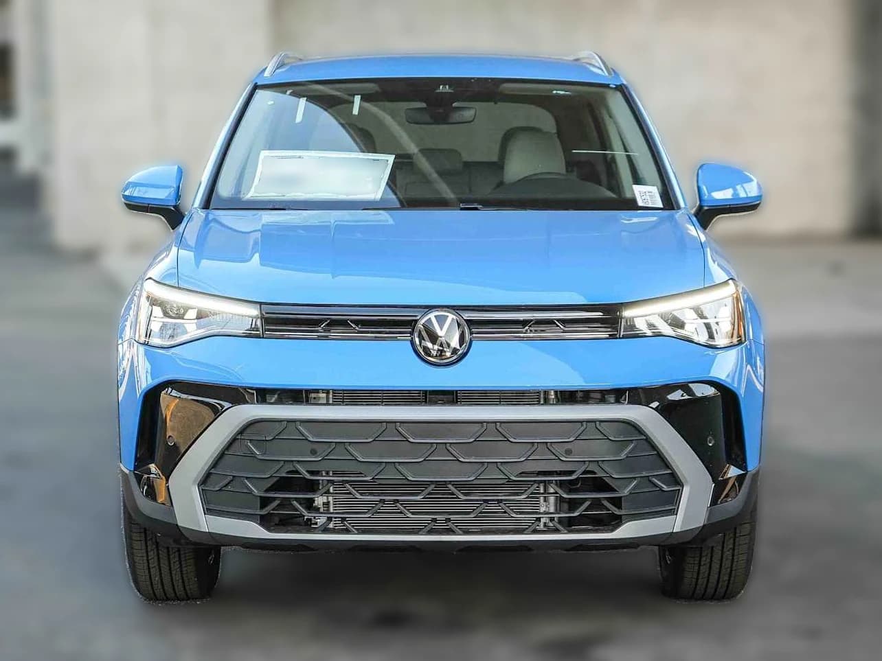 Volkswagen Taos SE 4MOTION 2026 — side view