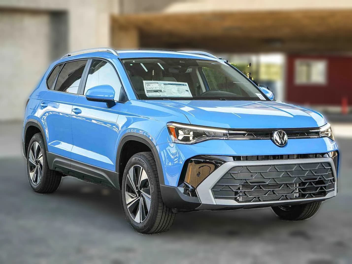 Volkswagen Taos SE 4MOTION 2026 — side view
