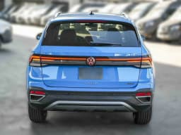 Volkswagen Taos SE 4MOTION 2026 — side view