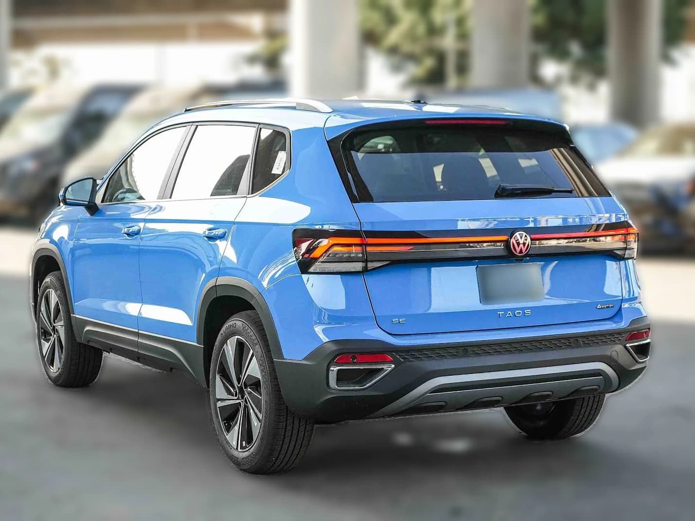 Volkswagen Taos SE 4MOTION 2026 — side view