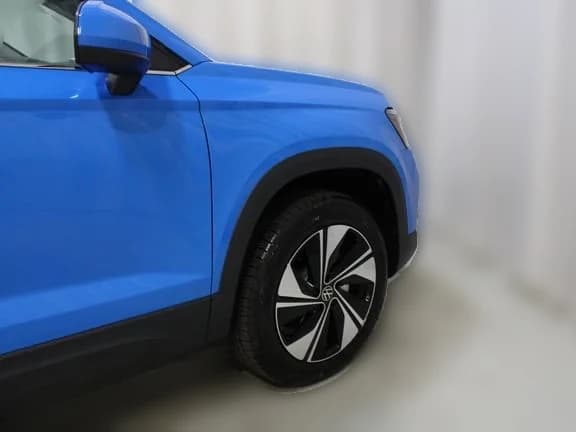 Volkswagen Taos SE 4MOTION 2026 — side view