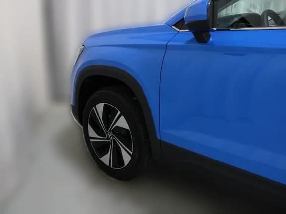 Volkswagen Taos SE 4MOTION 2026 — side view