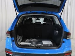 Volkswagen Taos SE 4MOTION 2026 — side view