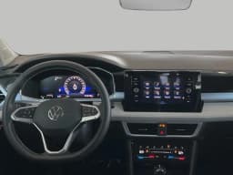 Volkswagen Taos SE 4MOTION 2026 — side view