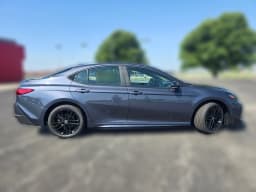 Toyota Camry SE AWD (Natl) 2026 — side view