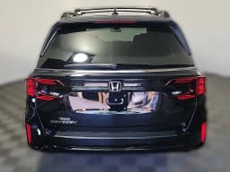 Honda Odyssey EX-L Auto 2026 — side view