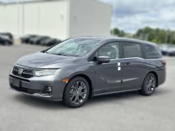 Honda Odyssey Touring Auto 2026 — side view