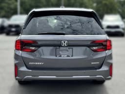 Honda Odyssey Touring Auto 2026 — side view