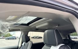 Honda Odyssey Touring Auto 2026 — side view