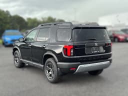 Honda Passport RTL AWD 2026 — side view
