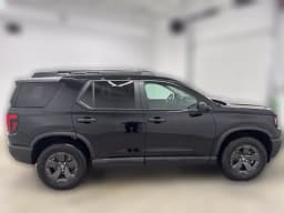 Honda Passport RTL AWD 2026 — side view