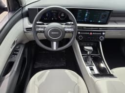 Hyundai Tucson SEL Plus FWD 2026 — side view