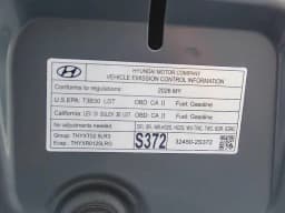 Hyundai Tucson SEL Plus FWD 2026 — side view