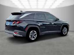 Hyundai Tucson SEL Plus FWD 2026 — side view