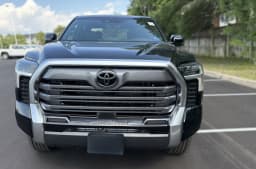 Toyota Tundra 4WD Limited CrewMax 5.5' Bed (Natl) 2026 — side view