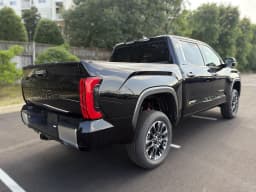 Toyota Tundra 4WD Limited CrewMax 5.5' Bed (Natl) 2026 — side view
