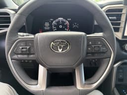 Toyota Tundra 4WD Limited CrewMax 5.5' Bed (Natl) 2026 — side view