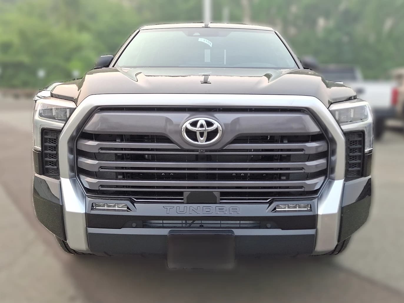 Toyota Tundra 4WD Limited CrewMax 5.5' Bed (Natl) 2026 — side view